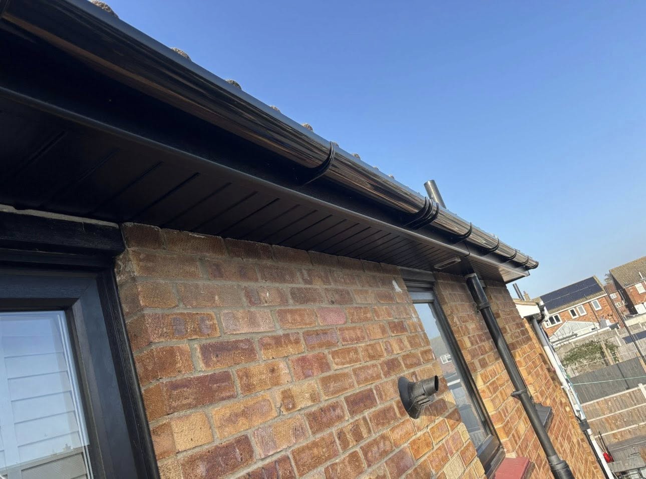 Crisp new roofline against blue sky