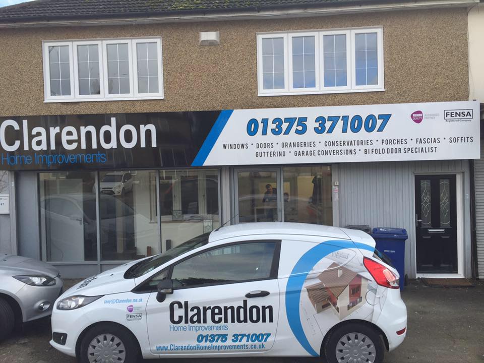 Clarendon Home Improvements shopfront in Stanford-le-Hope with branded car parked outside